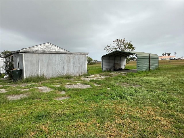 view of yard featuring a carport