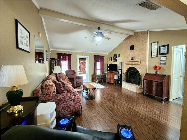 2742 Bramblebush Dr, Corpus Christi, TX 78410 - living area with a fireplace, a ceiling fan, and wood finished floors