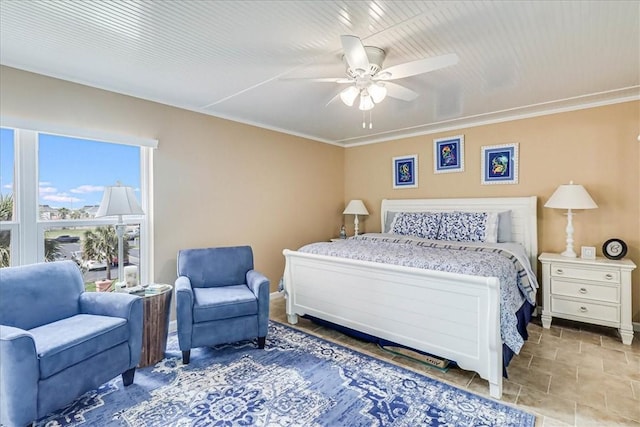 bedroom with crown molding and ceiling fan