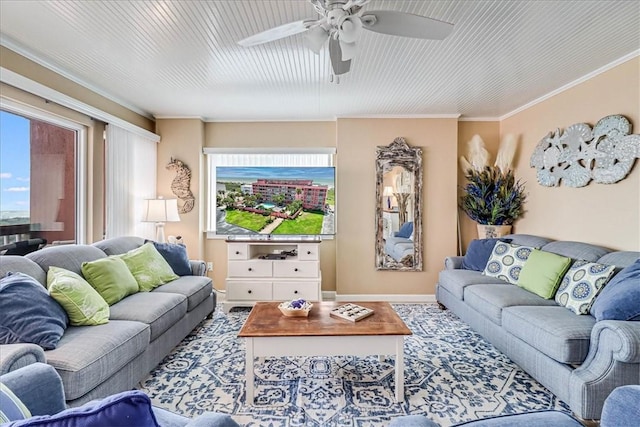 living room featuring ornamental molding, a wealth of natural light, and ceiling fan