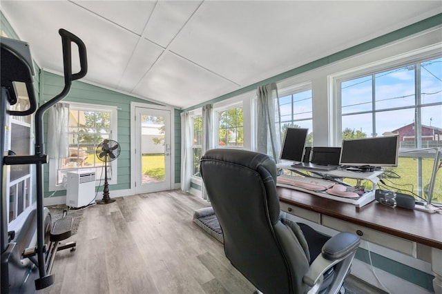office area with vaulted ceiling and wood finished floors