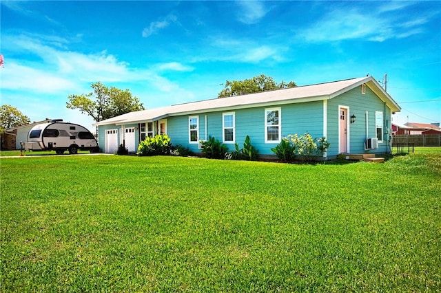 ranch-style house featuring a garage