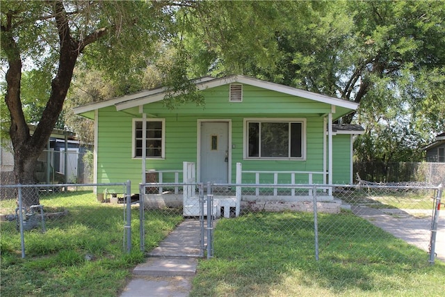 bungalow with a front yard