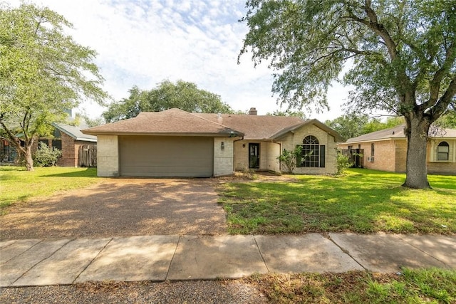 14618 Reagan Dr, Corpus Christi, TX 78410 - ranch-style house featuring a front lawn, a chimney, an attached garage, and driveway
