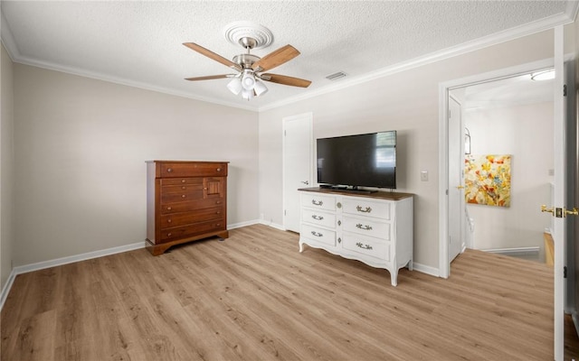 unfurnished bedroom featuring crown molding, a textured ceiling, ceiling fan, and light hardwood / wood-style flooring