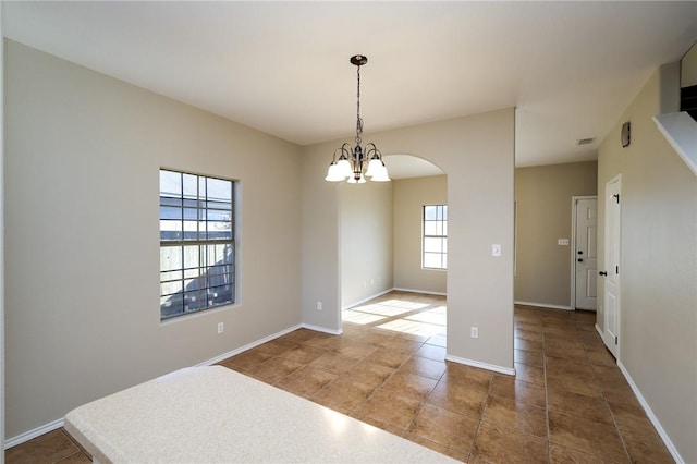 interior space featuring a chandelier