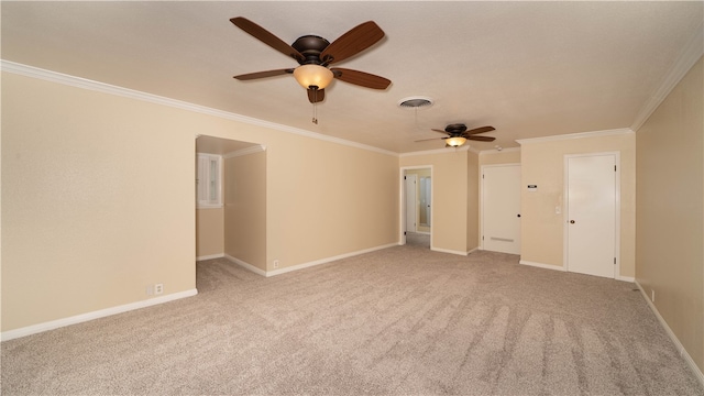 unfurnished room with light colored carpet, ceiling fan, and crown molding