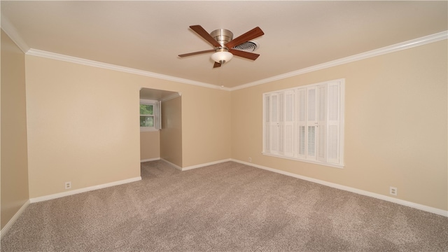 unfurnished room with ceiling fan, crown molding, and carpet floors