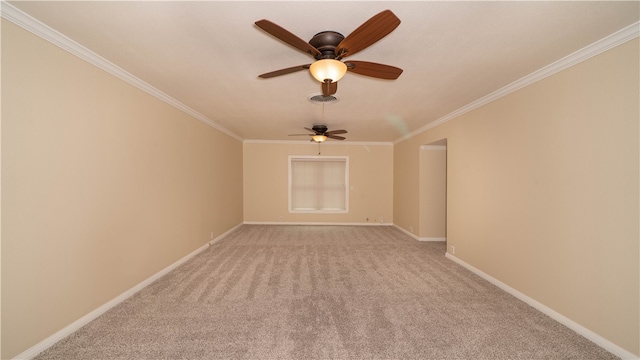 carpeted spare room featuring ornamental molding and ceiling fan