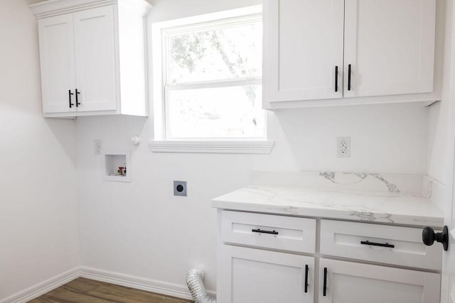 421 Anderson Dr, Alice, TX 78332 - laundry area featuring electric dryer hookup, cabinet space, washer hookup, and wood finished floors