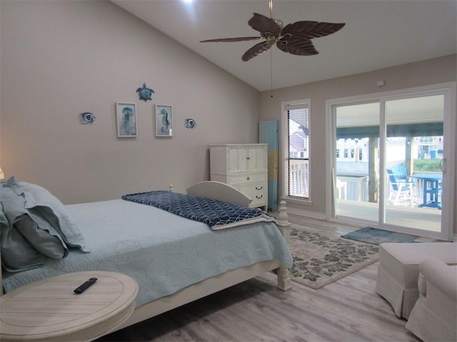13525 Bullion Ct, Corpus Christi, TX 78418 - bedroom featuring access to outside, wood finished floors, lofted ceiling, and a ceiling fan
