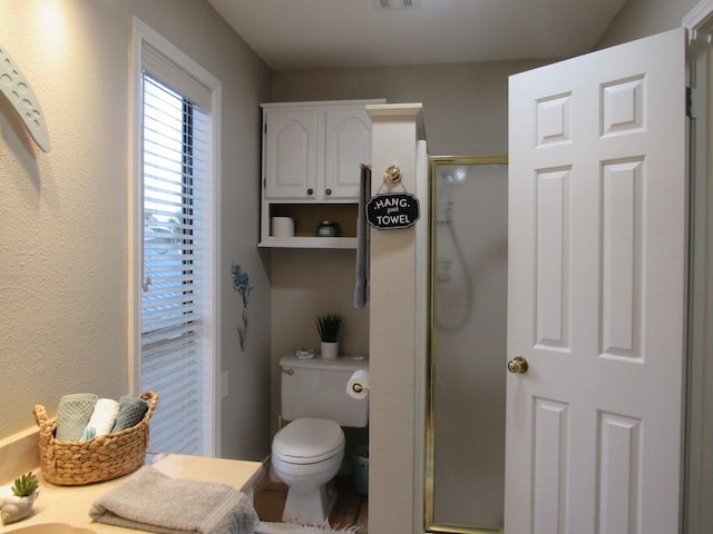 13525 Bullion Ct, Corpus Christi, TX 78418 - bathroom with a shower stall and toilet