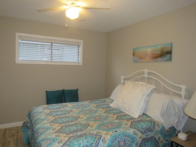 13525 Bullion Ct, Corpus Christi, TX 78418 - bedroom with wood finished floors and ceiling fan