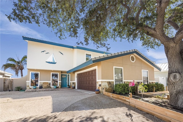 view of front of house with a garage