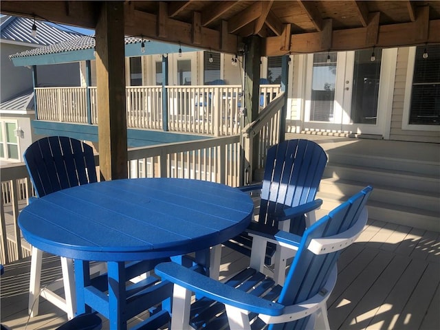 13525 Bullion Ct, Corpus Christi, TX 78418 - wooden deck featuring outdoor dining space