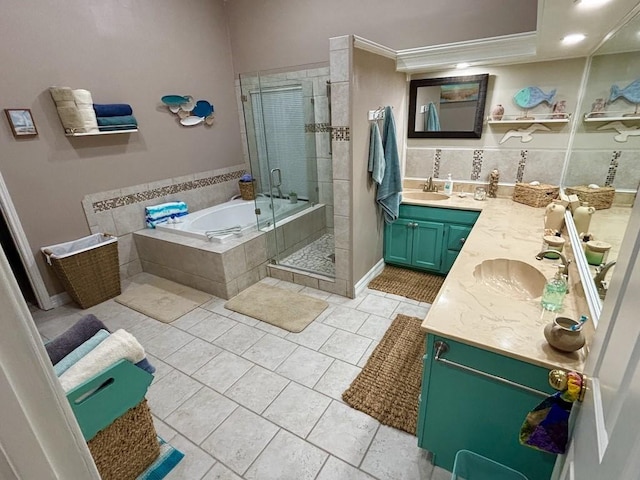 13525 Bullion Ct, Corpus Christi, TX 78418 - bathroom featuring double vanity, a bath, a stall shower, tile patterned flooring, and crown molding
