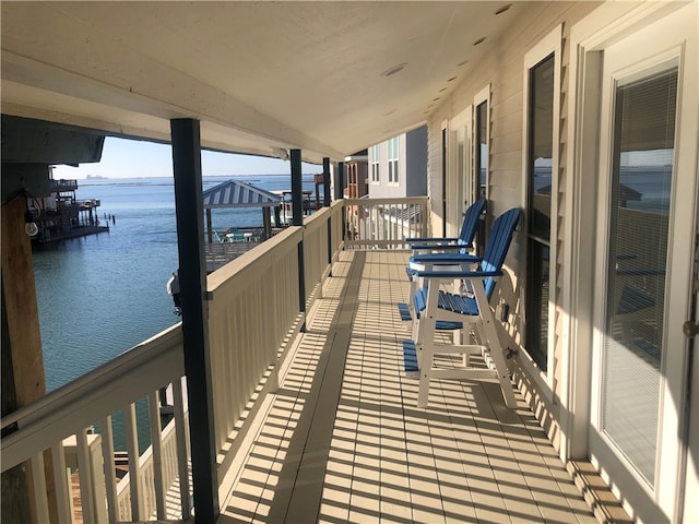 balcony featuring a water view