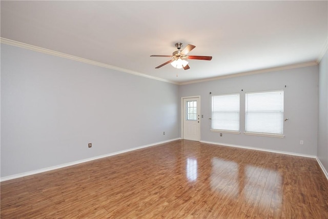 6513 Purplewing Dr, Corpus Christi, TX 78414 - unfurnished room featuring wood finished floors, ceiling fan, baseboards, and ornamental molding