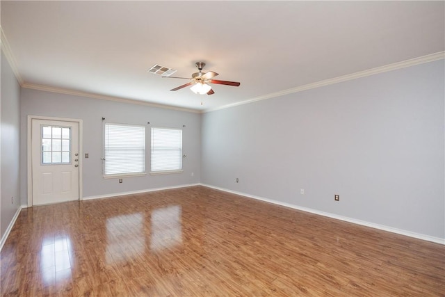 6513 Purplewing Dr, Corpus Christi, TX 78414 - unfurnished room featuring wood finished floors, ceiling fan, ornamental molding, and baseboards