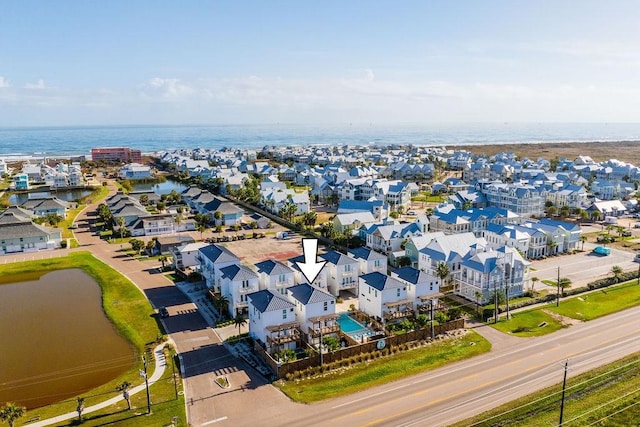 drone / aerial view with a water view