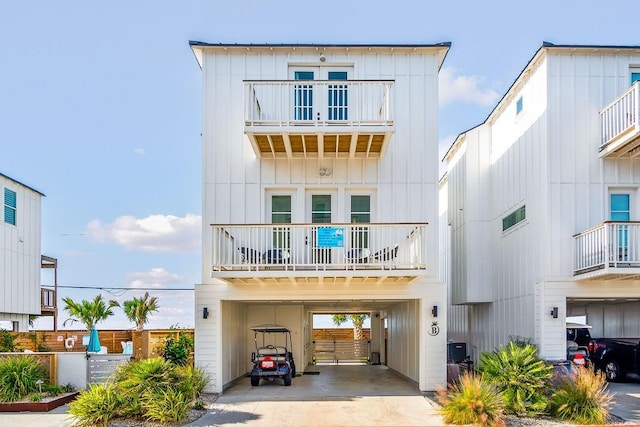 multi unit property featuring a carport and central air condition unit