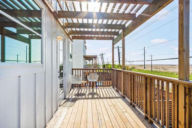 wooden deck with a pergola