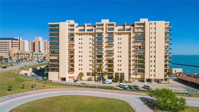 view of building exterior featuring a water view