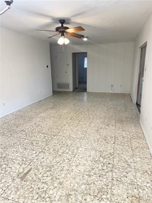 spare room featuring ceiling fan