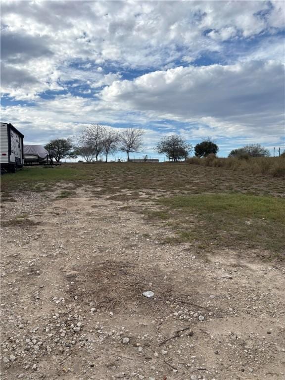 view of yard with a rural view