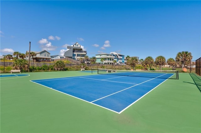 view of sport court with community basketball court and fence