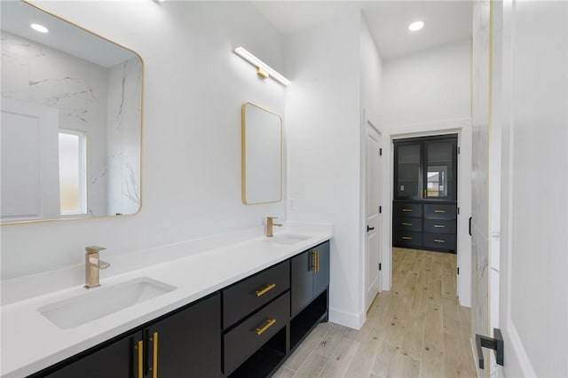 bathroom featuring vanity and hardwood / wood-style floors