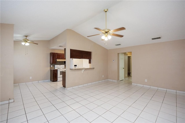 kitchen featuring light tile patterned floors, white range oven, ceiling fan, and lofted ceiling