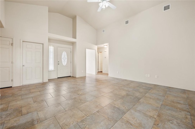 entrance foyer featuring high vaulted ceiling and ceiling fan