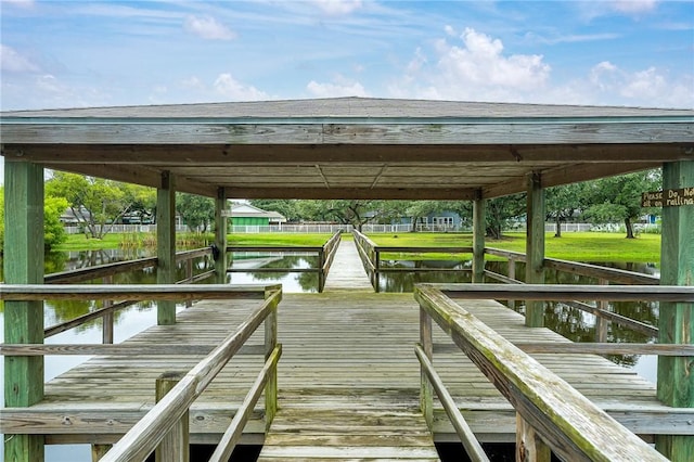 dock area featuring a water view