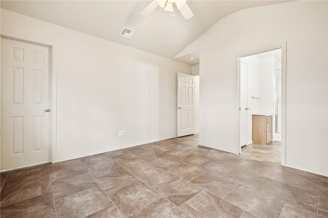 empty room with lofted ceiling and ceiling fan