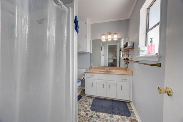 3410 Laguna Shrs, Corpus Christi, TX 78418 - bathroom featuring vanity, ornamental molding, and a shower with curtain