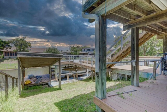 3410 Laguna Shrs, Corpus Christi, TX 78418 - wooden deck with stairs and a yard