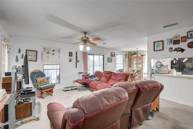 3410 Laguna Shrs, Corpus Christi, TX 78418 - carpeted living area with ceiling fan