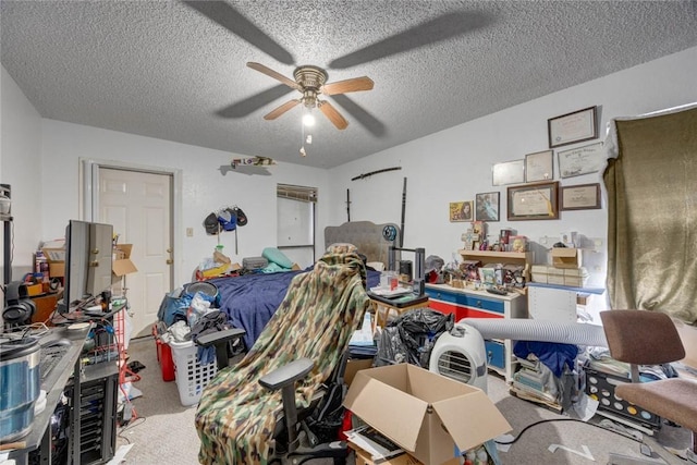 3410 Laguna Shrs, Corpus Christi, TX 78418 - carpeted bedroom with a textured ceiling and ceiling fan