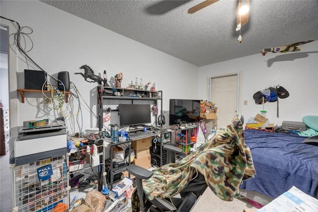 3410 Laguna Shrs, Corpus Christi, TX 78418 - bedroom featuring a textured ceiling, a ceiling fan, and carpet