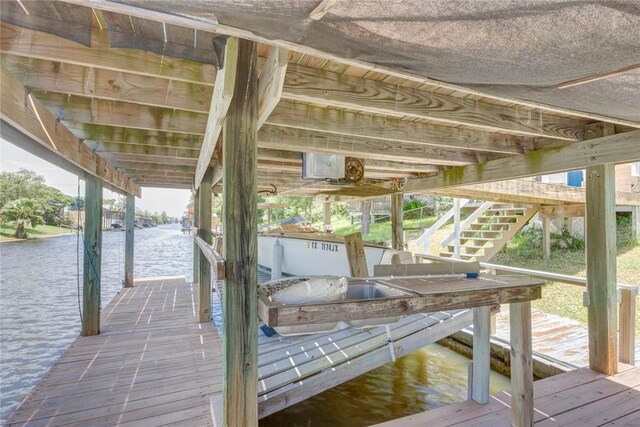 3410 Laguna Shrs, Corpus Christi, TX 78418 - dock featuring a water view and boat lift