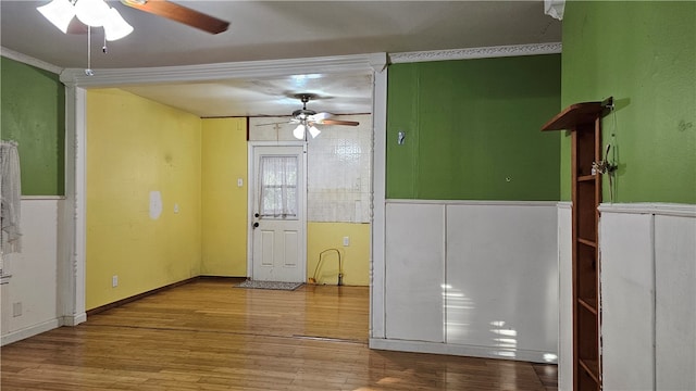 interior space with hardwood / wood-style floors and ceiling fan