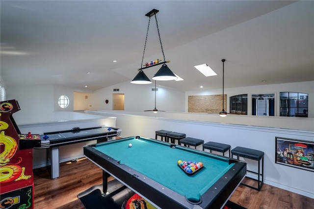 playroom featuring dark hardwood / wood-style flooring, lofted ceiling, and billiards