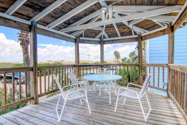 wooden terrace with a gazebo