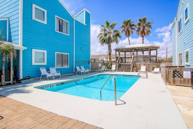 view of pool featuring a patio and a gazebo