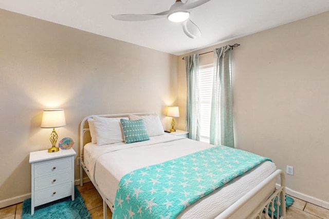 bedroom featuring ceiling fan and tile patterned floors