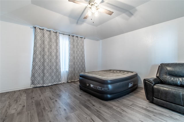 bedroom featuring light hardwood / wood-style floors and ceiling fan