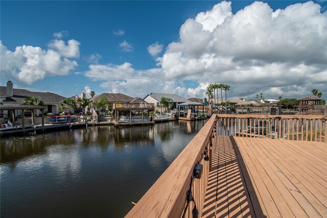 dock area with a water view