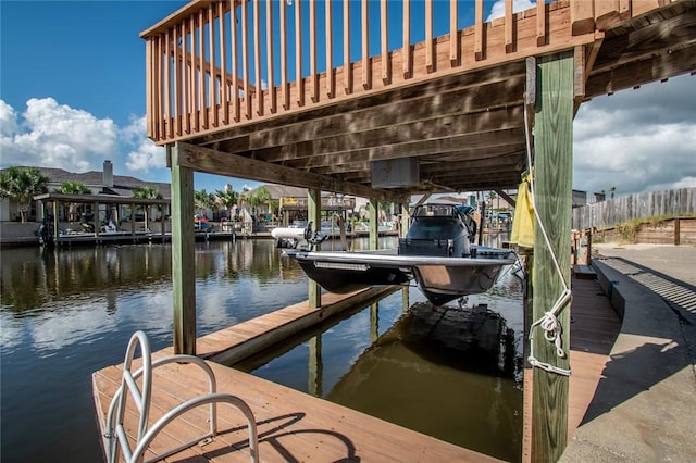 15957 San Felipe Dr, Corpus Christi, TX 78418 - dock area featuring boat lift and a water view