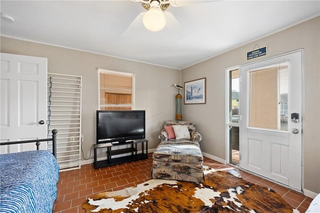 interior space with ceiling fan